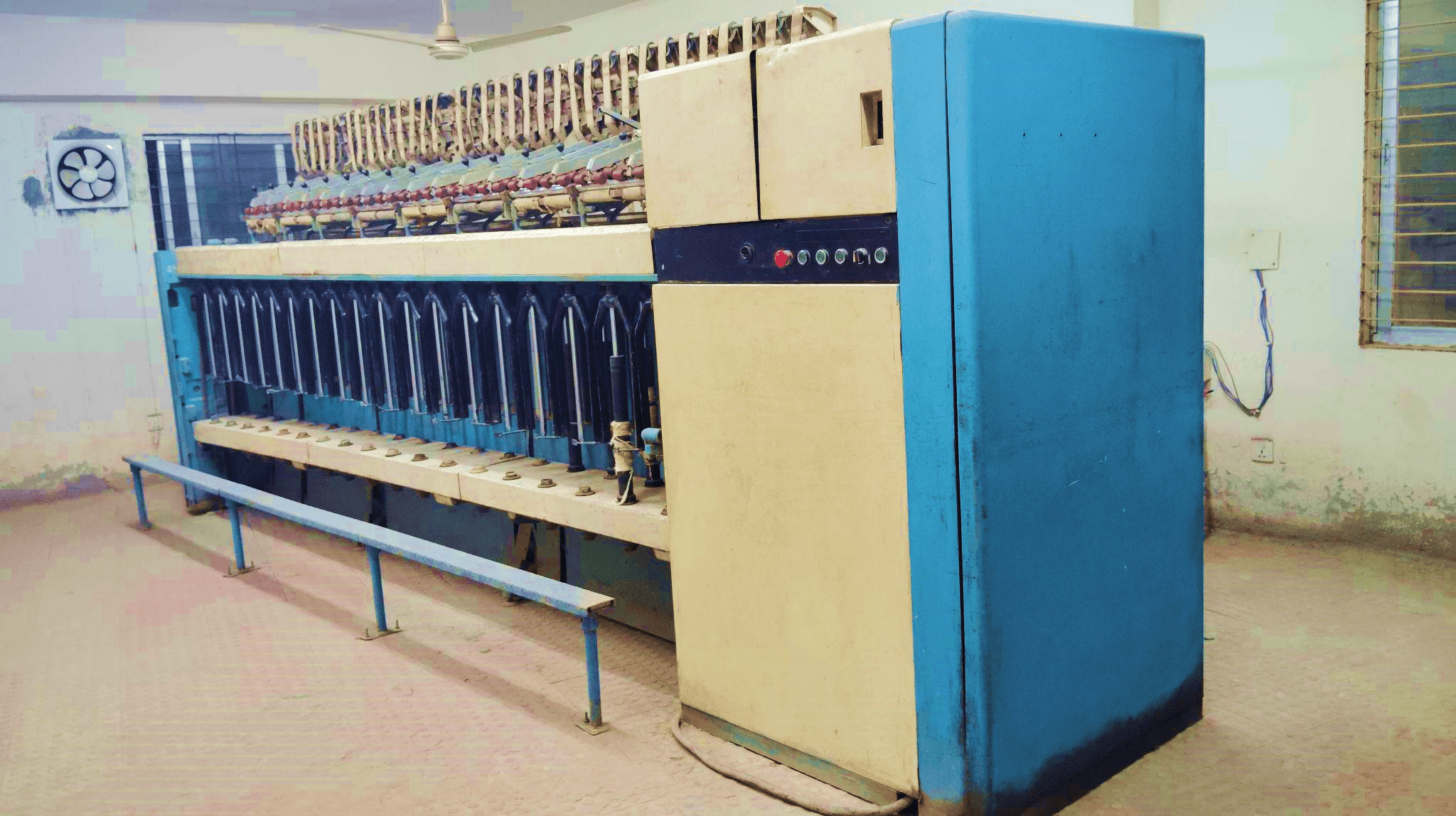 Simplex machine - blue and beige textile equipment